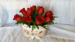 10 Rosas en caja vintage
